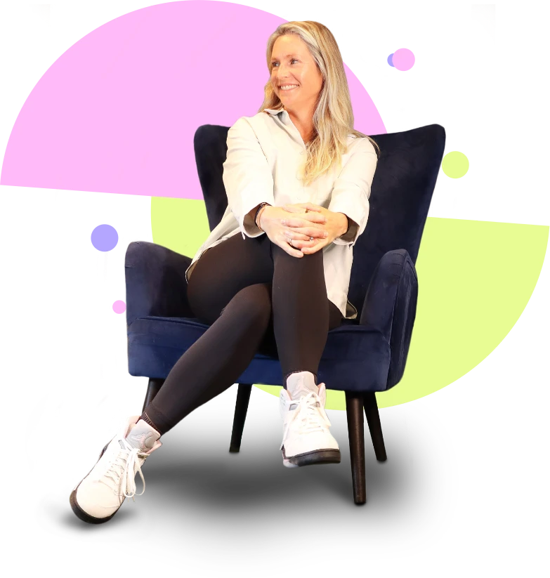 Julia Wuttke Feel Better Golf Coach & Health Coach, posing on a chair