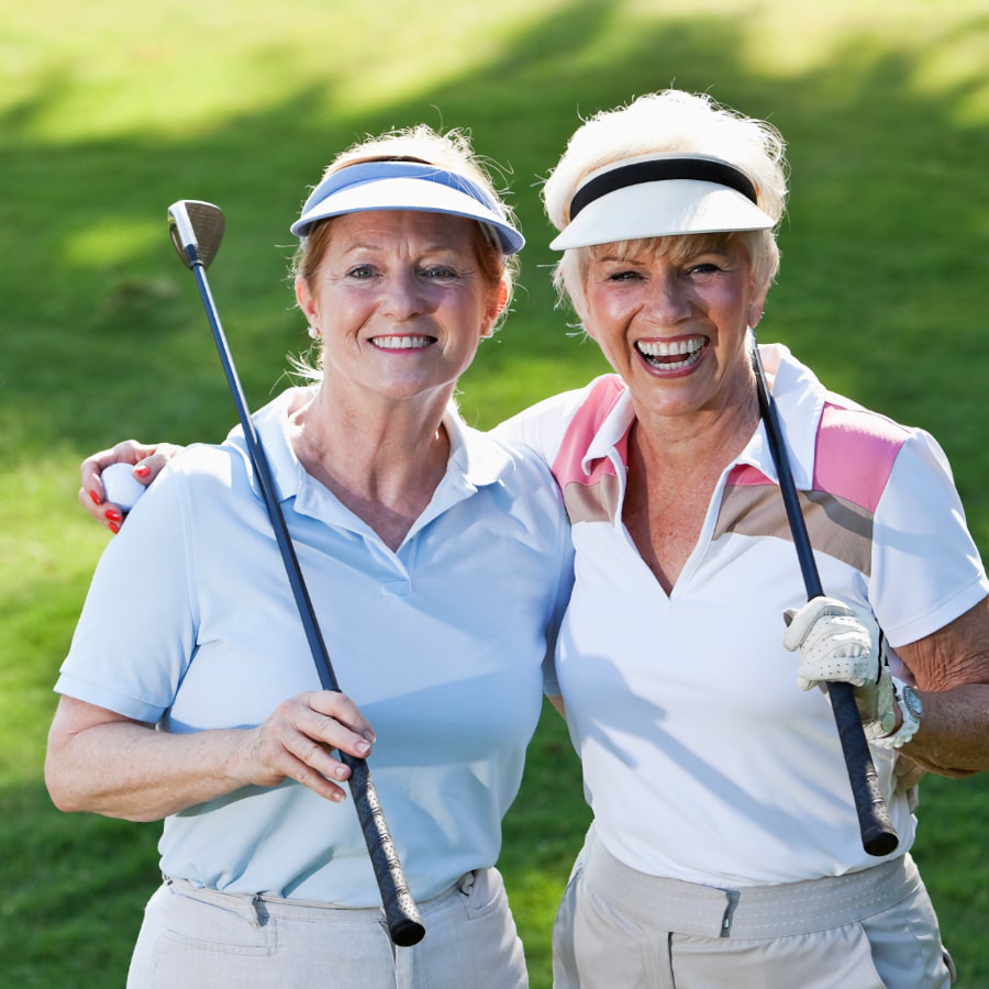 Julia Wuttke Feel Better Golf Coach & Health Coach, two women loving their golf